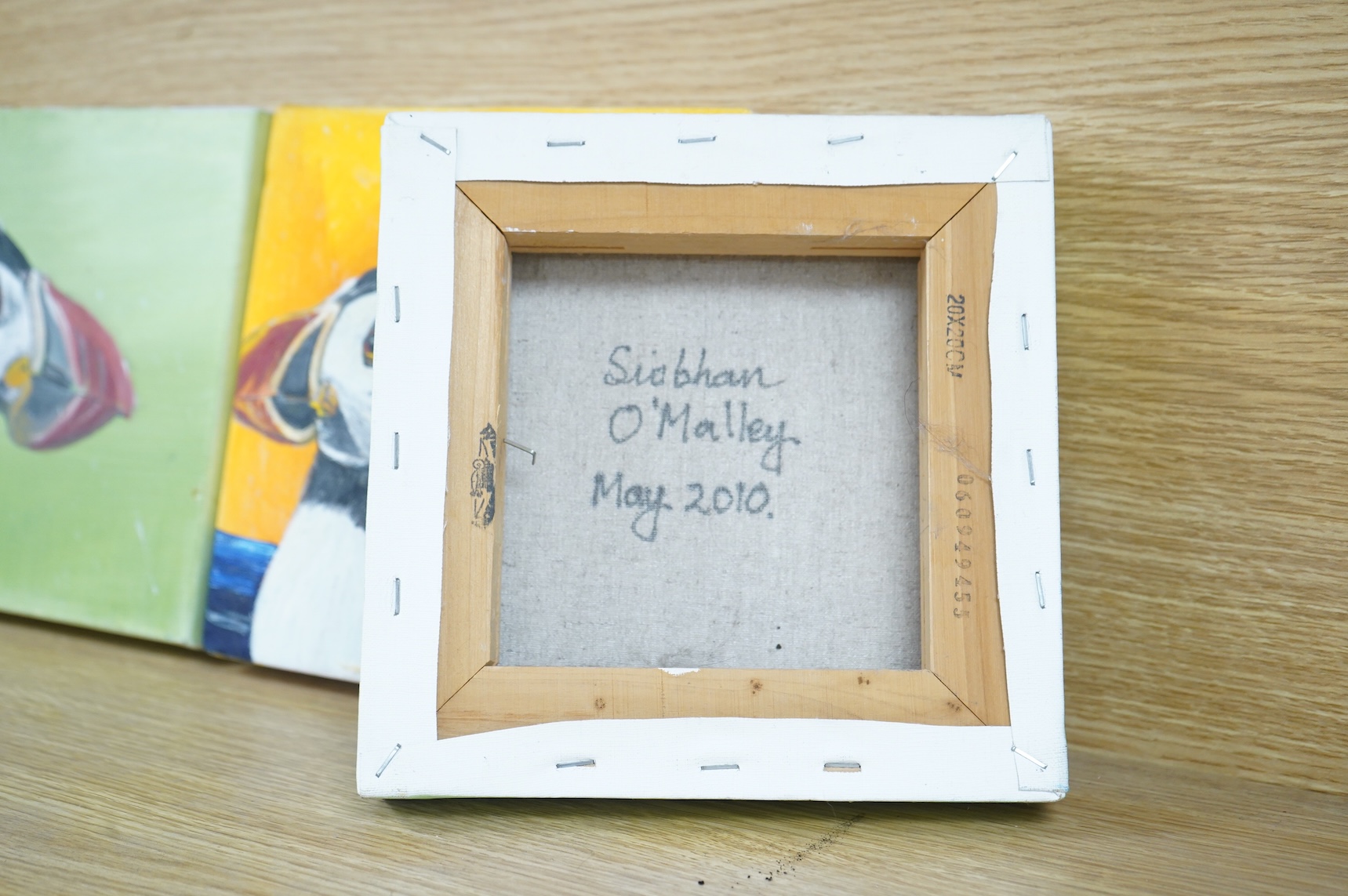 Siobhan O'Malley (Irish, contemporary), Studies of puffins, a set of three oils on canvas, each signed and dated 2010 verso, 20 x 20cm unframed